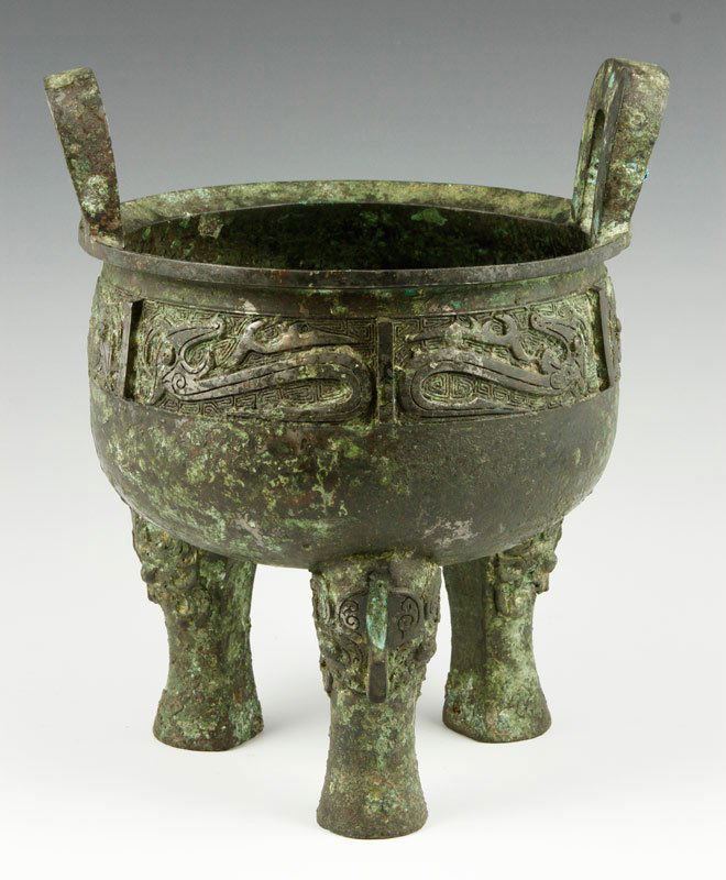 Chinese Antique Bronze Censer: Antique bronze censer, China, on tripod legs and decorated with archaic incised patterns on the bowl, 9 1/4" h x 8" dia.