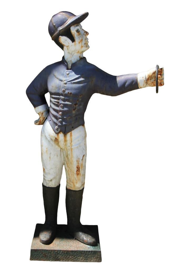 Antique Cast Iron Lawn Jockey: Antique cast iron lawn jockey. Provenance: Estate of the late Joseph W. Haley, of Pride's Crossing, Massachusetts.