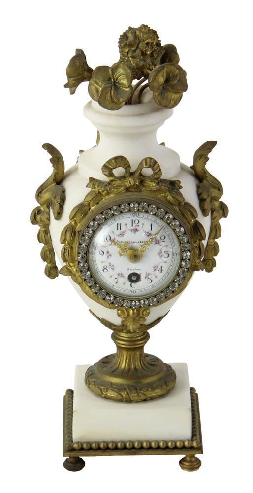 19thC French Clock by Shreve, Crump, and Low: 19th century French clock with porcelain dial and original key, made by Shreve, Crump, and Low, Boston, 9 1/2 x 4 x 3 1/4. Provenance: Estate of the late Joseph W. Haley, of Pride's Crossing,