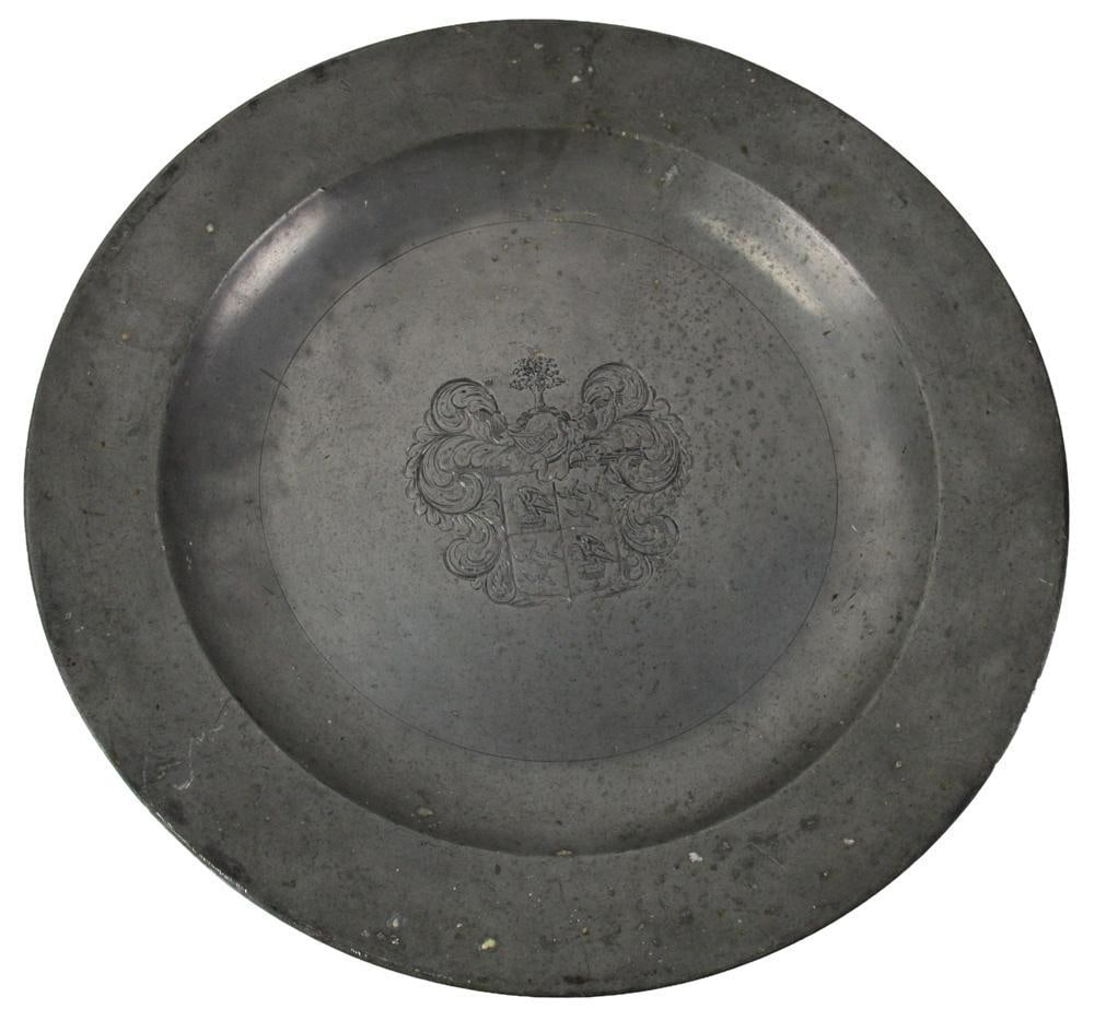 18thC Pewter Charger with Crest: 18th century pewter charger with crest, dated 1772 M.R., 16 diameter. Provenance: Estate of the late Joseph W. Haley, of Pride's Crossing, Massachusetts.