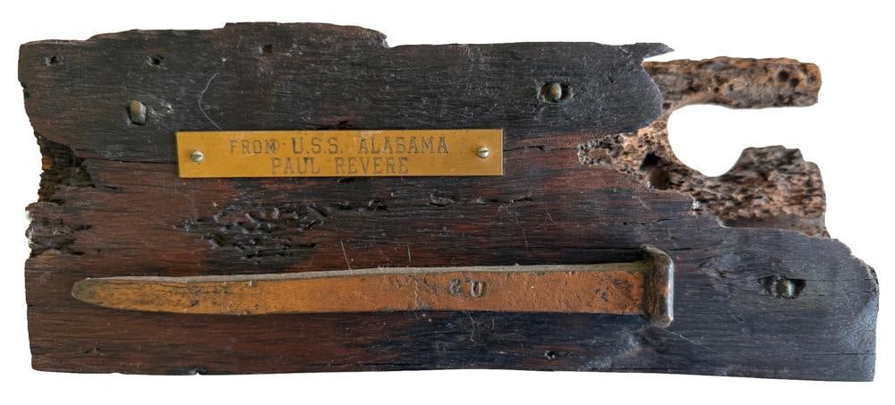 U.S.S. Alabama Part with Paul Revere Copper Spike: From U.S.S. Alabama, part of the ship with Paul Revere copper spike, 4 1/2" x 11" x 4", with other blocks of wood and spikes. Provenance: Estate of the late Joseph W. Haley, of Pride's Crossing,