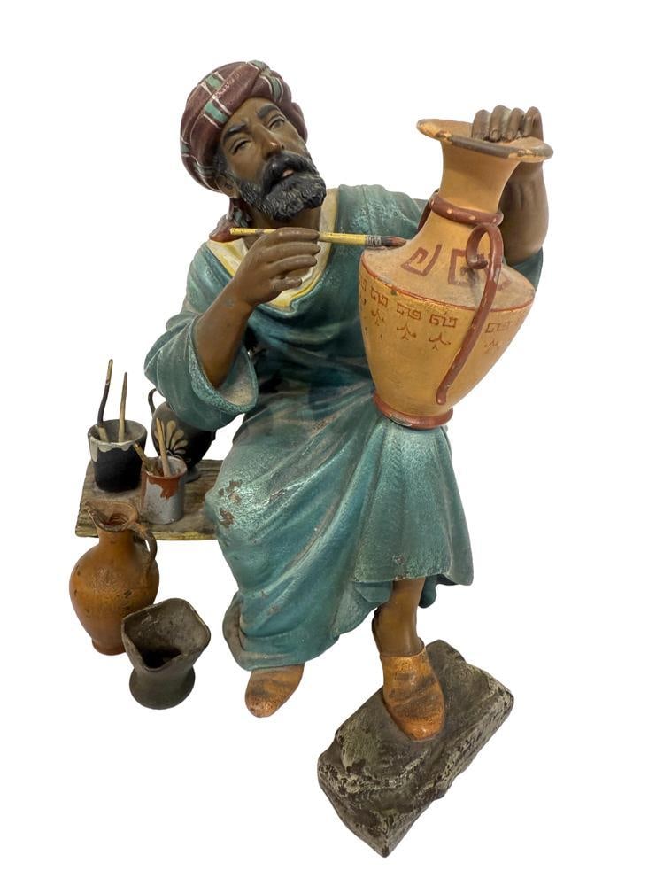 German Painted Bronze of Arabic Artist: German painted bronze of an Arabic artist, 6" x 5". Provenance: Estate of the late Joseph W. Haley, of Pride's Crossing, Massachusetts.