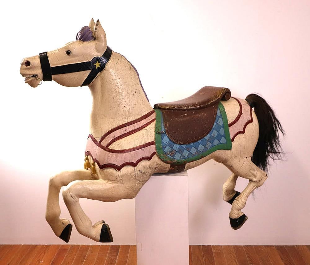 Antique Paint Decorated Carousel Horse: Antique paint decorated carousel horse, 50" H x 50" W x 14" D. Provenance: From a Coney Island, New York estate.
