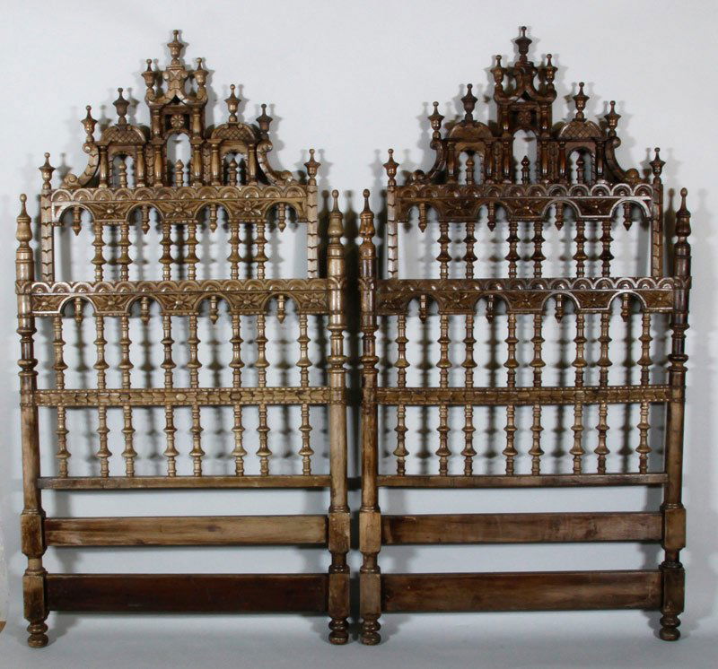 2 Spanish Colonial Headboard: Lot of two 19th century, Spanish Colonial headboards, heavily carved soft wood possily walnut, 84"h x 44"w (each).