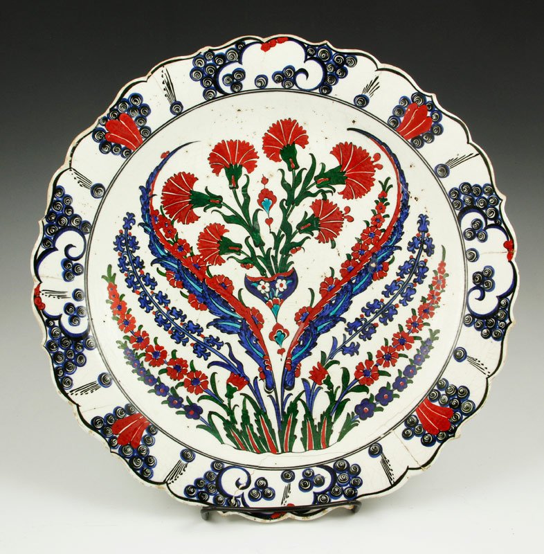 17th/18th C. Turkish Iznik Pottery Charger: 17th/18th century, Turkish Iznik Pottery charger, 15 3/4"dia. Some rim chips, hairlines and restoration.
