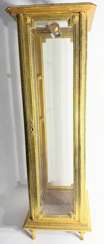 Gilt and glass cabinet: Gilt and glass cabinet. NOTE: Item to be picked up at 64 East 80th St., New York, NY. Deadline for pick-up is July 31st. Please call our front desk at 978-927-2223 to schedule pick-up.