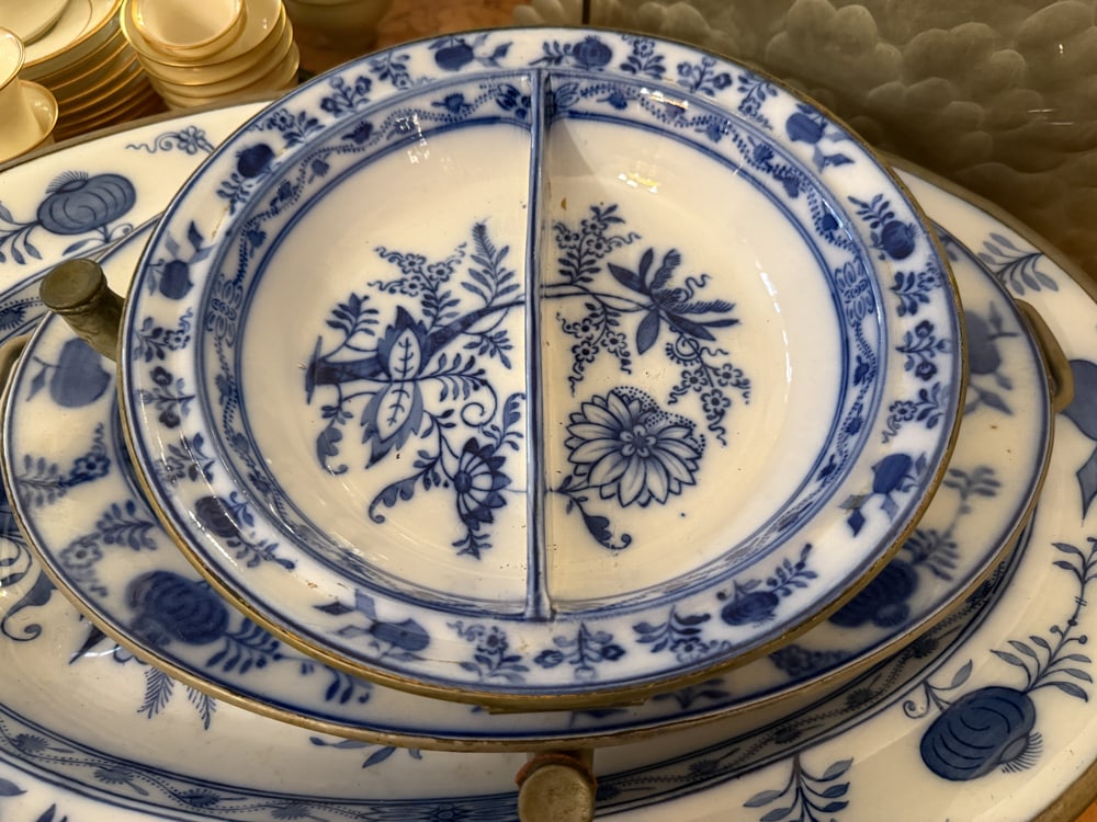 Three German Blue Onion Food Warmers: Three German Blue Onion food warmers, longest 25". NOTE: Item to be picked up at 64 East 80th St., New York, NY. Deadline for pick-up is July 31st. Please call our front desk at 978-927-2223 to schedu