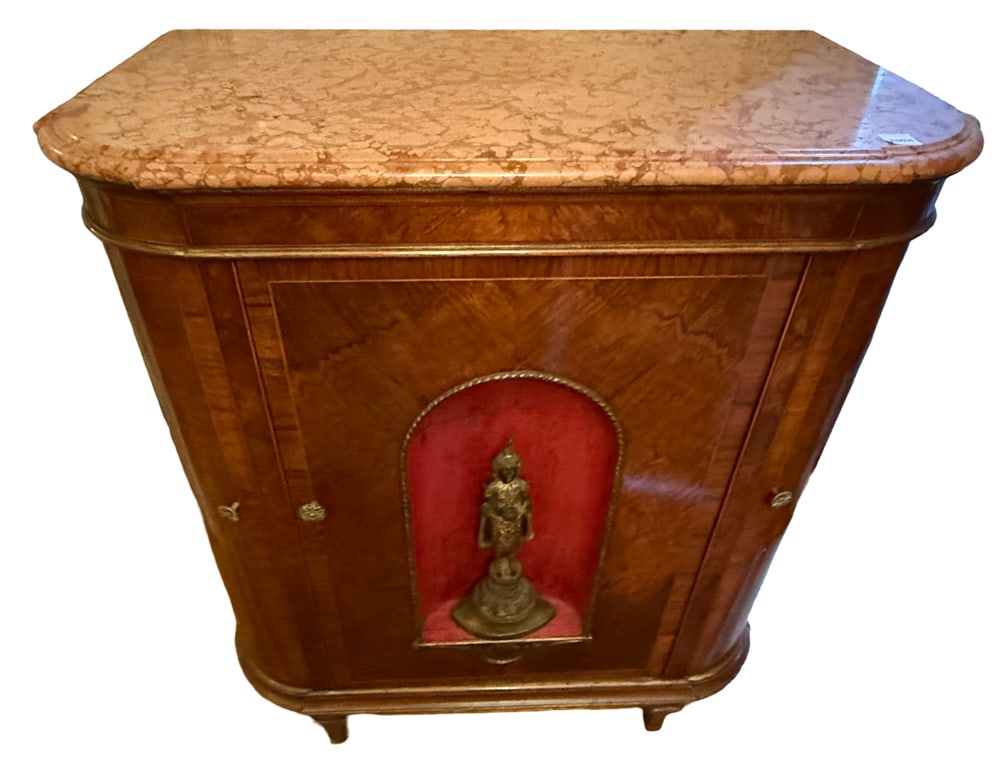1920s Deco Marble-Top Cabinet with Thai Figure in Door: Deco 1920s cabinet having a marble top and a Thai bronze figure mounted in front door, 37" x 33" x 19". NOTE: Item to be picked up at 64 East 80th St., New York, NY. Deadline for pick-up is July
