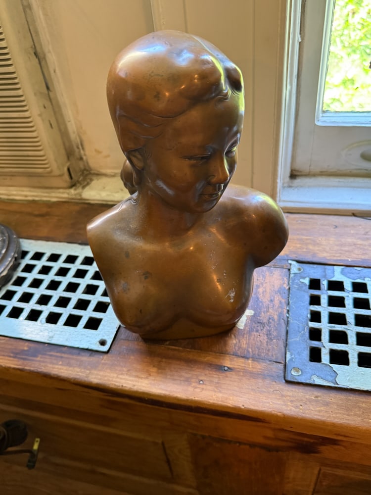 Bronze Bust of Vietnamese Girl, with Plinth: Bronze bust of Vietnamese girl, with plinth, 11" x 6". NOTE: Item to be picked up at 64 East 80th St., New York, NY. Deadline for pick-up is July 31st. Please call our front desk at 978-927-2223 to sc