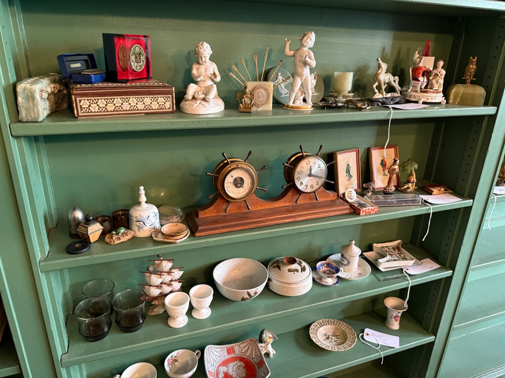 Assorted Clocks, Meissen, Pottery, Prints, Asian Objects, etc.: Large assortment of clocks, Meissen, pottery, shell ship, framed prints, carved stone horse, jasperware, Asian objects, inlaid wooden box (5 shelves). NOTE: Item to be picked up at 64 East 80th St., N