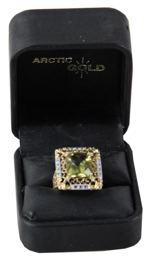 14k Yellow Gold Ring with Yellow Stone: 14k yellow gold ring with yellow stone, size 7 1/2. Approximately 7.4 grams TW. Provenance: Littleton, Massachusetts collection. PLEASE NOTE: payment for silver, gold, jewelry, and coins must be made 