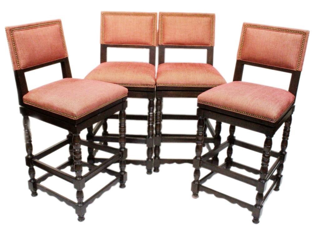 English-style Custom Upholstered Tall Pub Chairs: English-style custom upholstered tall pub chairs having brass tacking, set of (4), 46" H x 20" W x 21" D. Provenance: Owings Mills, Maryland collection.