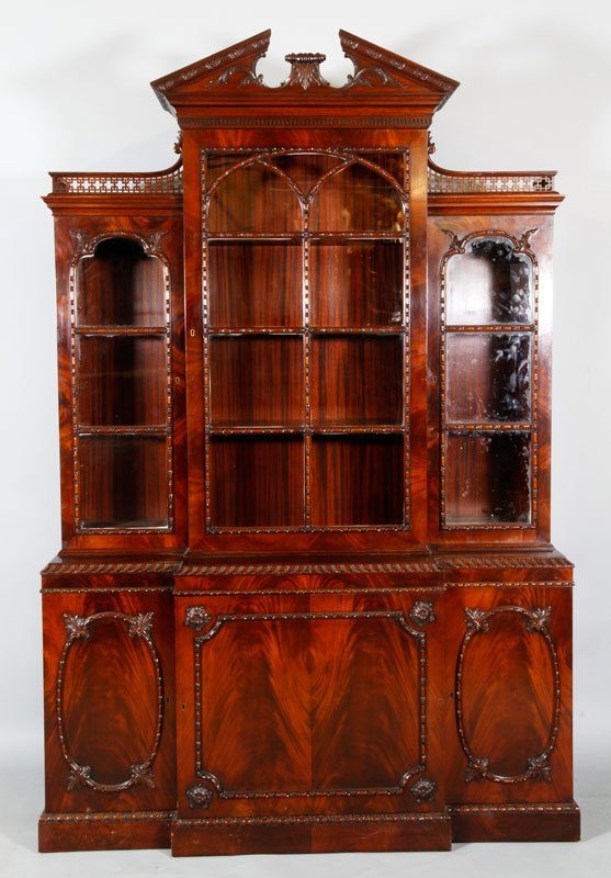 Mahogany Breakfront: Breakfront, carved mahogany, 86" h x 56.5" w x 20" d. No keys.