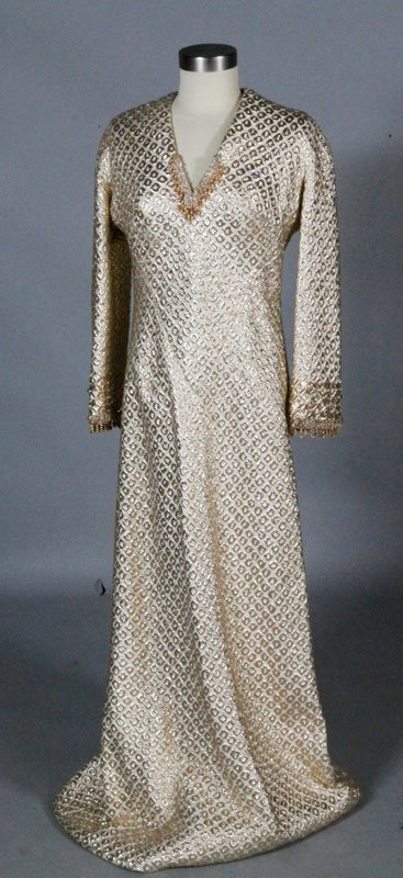3 Jacques Griffe Floor Length Dresses: Three floor length dresses, Jacques Griffe, circa 1970s, to include: purple long sleeve with belt and slip, approximate size 8; orange crepe sleeveless shift dress, approximate size 10; gold brocade l