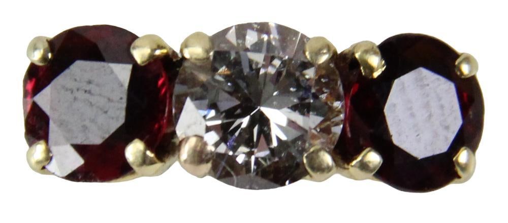 18k Yellow Gold, Diamond, and Ruby or Garnet Ring: 18k yellow gold, diamond, and ruby or garnet ring, diamond approximately 1.0 ct. Ring size 5. Approximately 3.6 grams TW. Provenance: Beverly, Massachusetts collection. PLEASE NOTE: payment for silver