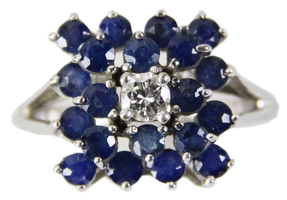 14k White Gold, Diamond, and Sapphire Ring: 14k white gold, diamond, and sapphire ring, size 6 3/4. Approximately 4.9 grams TW. Provenance: Littleton, Massachusetts collection. PLEASE NOTE: payment for silver, gold, jewelry, and coins must be m