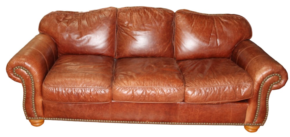 Brown Leather Sofa: Brown leather sofa, 35" H x 92" L x 37" D. Provenance: Stockton, Maine estate.
