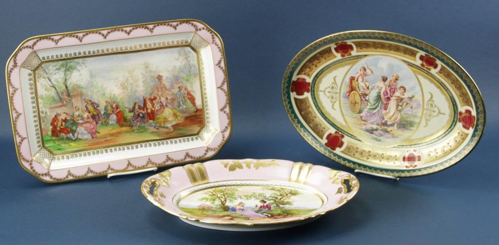 Group of (3) Platters: Group of (3) platters, to include: oval pink platter; rectangular platter; oval platter with handles.