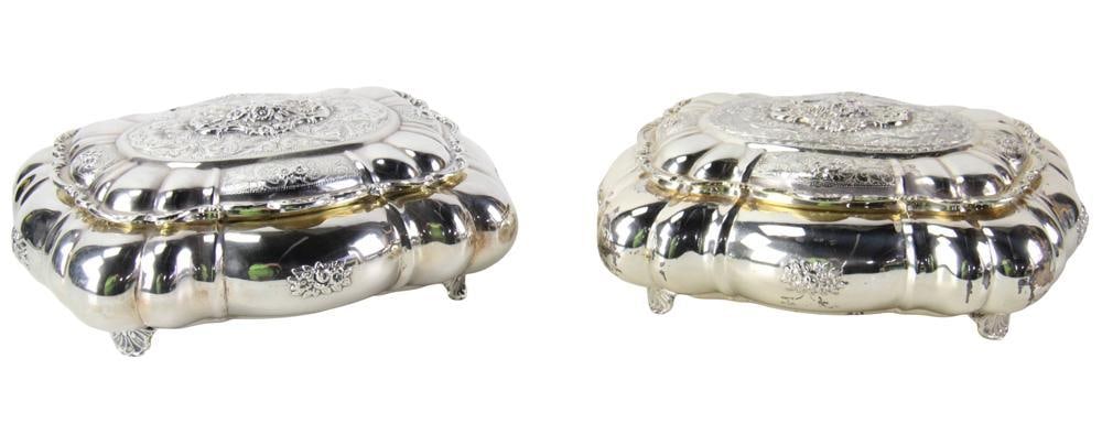 Pair of Peruvian Sterling Covered Boxes: Pair of Peruvian sterling covered boxes. Approximately 4 1/2" H x 10" W x 8" D. Approximately 54.0 troy oz TW. Provenance: La Jolla, California collection. PLEASE NOTE: payment for silver, gold, jewel
