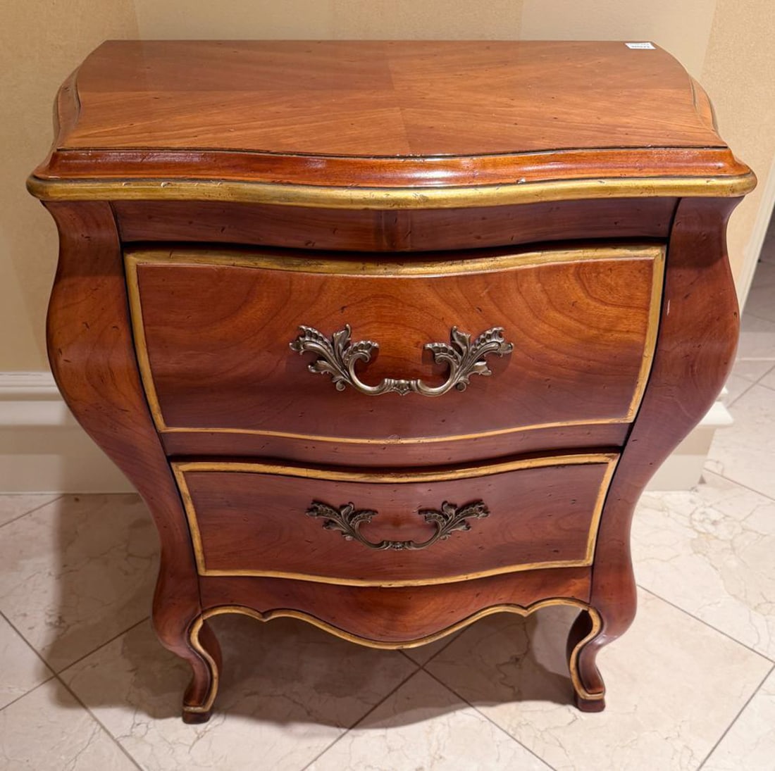 Italian-style Bombe 2-Drawer Chest: Italian-style bombe 2-drawer chest, 24" H x 24" W x 18" D.