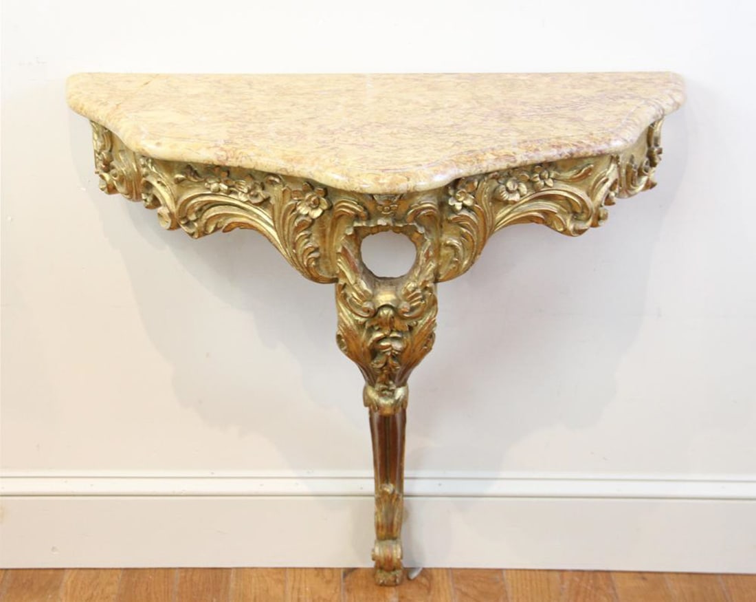 French Carved Giltwood Marble-Top Table: French carved giltwood table with marble top, 31" H x 30" W x 16" D. Provenance: Palm Beach, Florida estate.