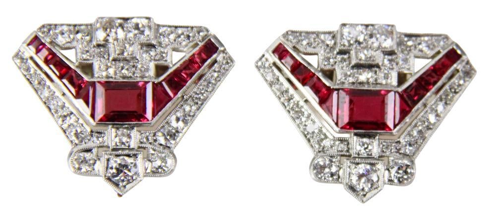 1940s Platinum, Diamond, and Natural Ruby Clips: 1940s platinum, diamond, and natural ruby clips, signed by the jeweler "Wedderien". Approximately 19.6 grams TW. Provenance: New York City, New York collection. PLEASE NOTE: payment for silver, gold, 