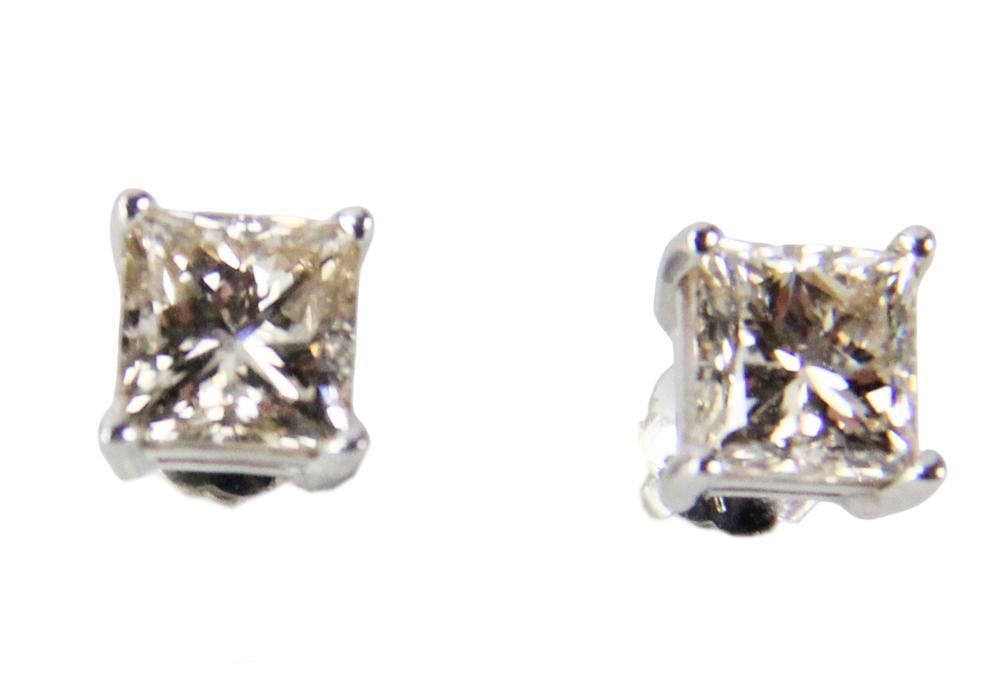Ladies' 14k Gold and 1ct Diamond Earrings: Ladies' 14k gold and diamond earrings, each earring approximately 1.0 ct. Approximately 1.4 grams TW. Provenance: New York City, New York collection. PLEASE NOTE: payment for silver, gold, jewelry,