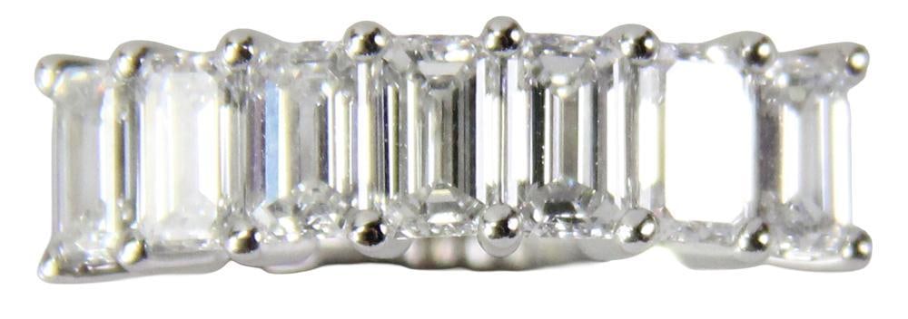 Platinum and Diamond Band: Platinum and diamond band, approximately 1.95 ct, ring size 6 1/2. Approximately 7.2 grams TW. Provenance: New York City, New York collection. PLEASE NOTE: payment for silver, gold, jewelry, and coins