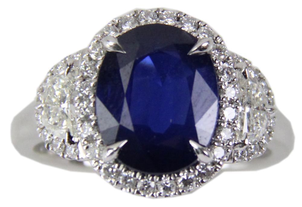 Platinum, Diamond, and Sapphire Ring: Platinum, diamond, and sapphire ring, diamond approximately 0.90 ct; sapphire approximately 4.15 ct. Ring size 7. Approximately 9.2 grams TW. Provenance: New York City, New York collection. PLEASE NOT