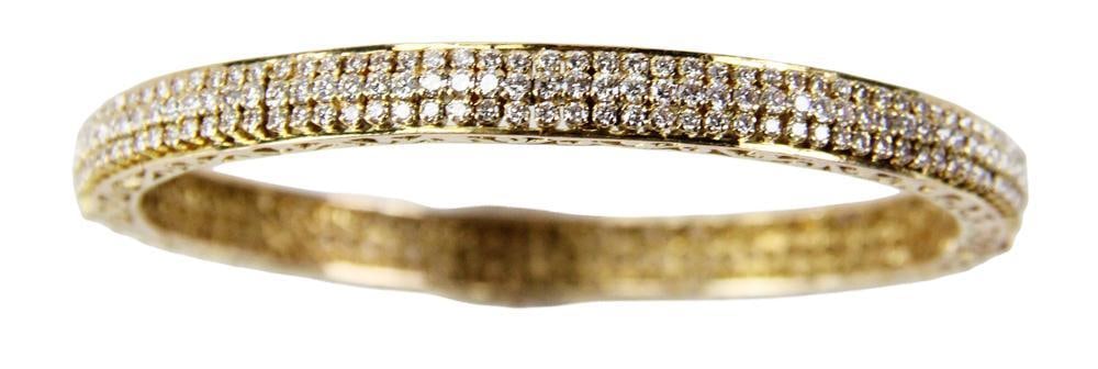 18k Gold and Diamond Bracelet: 18k gold and diamond bracelet, 7 1/2" diameter. Approximately 29.3 grams TW. Provenance: New York City, New York collection. PLEASE NOTE: payment for silver, gold, jewelry, and coins must be made via 