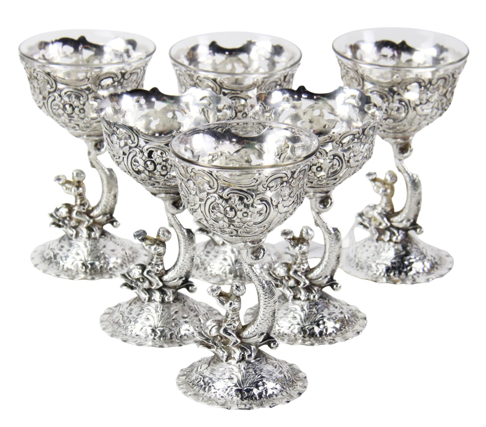 Group of Silver Wine Glasses with Figural Stems: Group of silver wine glasses with figural stems, (6) total, 6" H, (4) with glass liners. Unhallmarked. Approximately 54.8 troy oz TW of silver. Provenance: New York estate. PLEASE NOTE: payment for