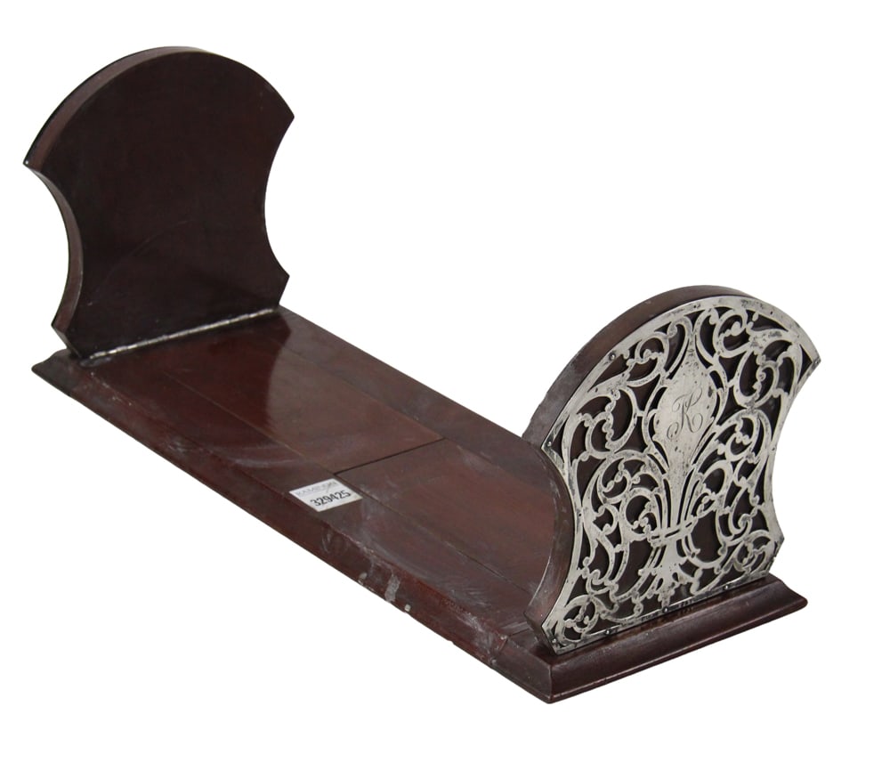 Sterling and Mahogany Adjustable Bookends: Sterling and mahogany adjustable bookends, 6 3/4" H x 17" W x 6" D. Provenance: New York estate.