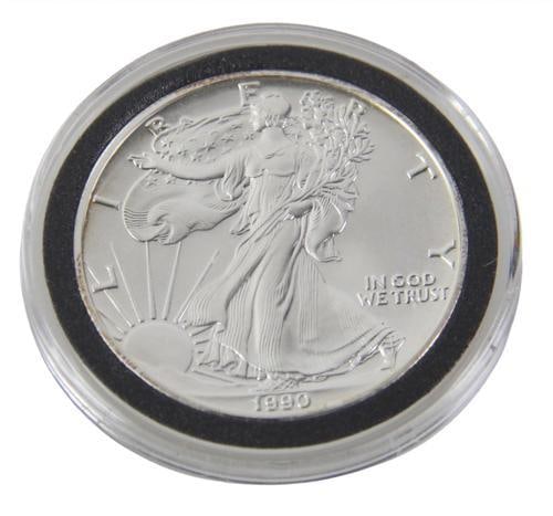 1990 American Silver Eagle One-Dollar Coin in Case: 1990 American Silver Eagle one-dollar coin in case, one ounce fine silver. Provenance: New York estate. PLEASE NOTE: payment for silver, gold, jewelry, and coins must be made via wire transfer, cash, 