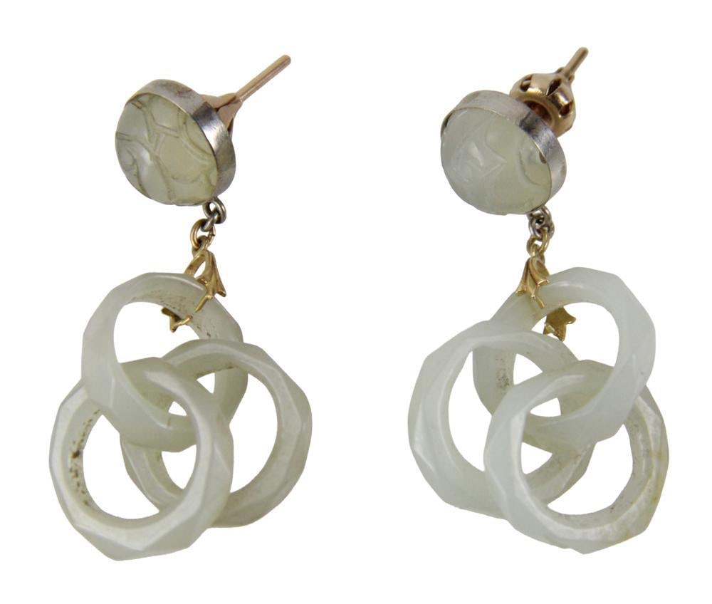 Pair of 14k White Gold and Carved Jade Post Earrings: Pair of 14k white gold and carved jade post earrings, 1 3/4" H. Provenance: New York estate. PLEASE NOTE: payment for silver, gold, jewelry, and coins must be made via wire transfer, cash, or certifie