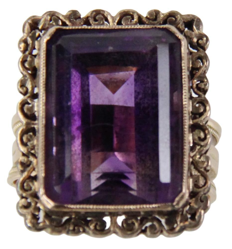 14k Yellow Gold and Amethyst Ring: 14k yellow gold and amethyst ring, size 9. Approximately 9.0 grams TW. Provenance: New York estate. PLEASE NOTE: payment for silver, gold, jewelry, and coins must be made via wire transfer, cash, or c