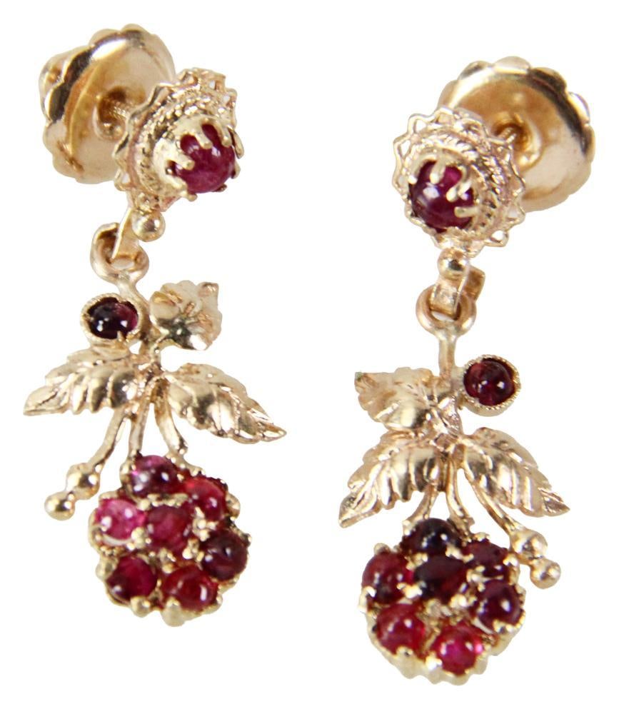 Pair of 14k Yellow Gold and Ruby Post Earrings: Pair of 14k yellow gold and ruby post earrings, 1 1/4". Approximately 7.1 grams TW. Provenance: New York estate. PLEASE NOTE: payment for silver, gold, jewelry, and coins must be made via wire transfe