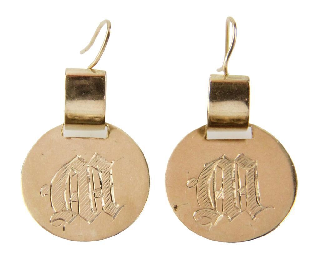 Pair of 14k Yellow Gold Earrings with Engraved "M": Pair of 14k yellow gold earrings with engraved initial "M", 1 3/4" H x 7/8" diameter. Approximately 10.9 grams TW. Provenance: New York estate. PLEASE NOTE: payment for silver, gold, jewelry, and coin