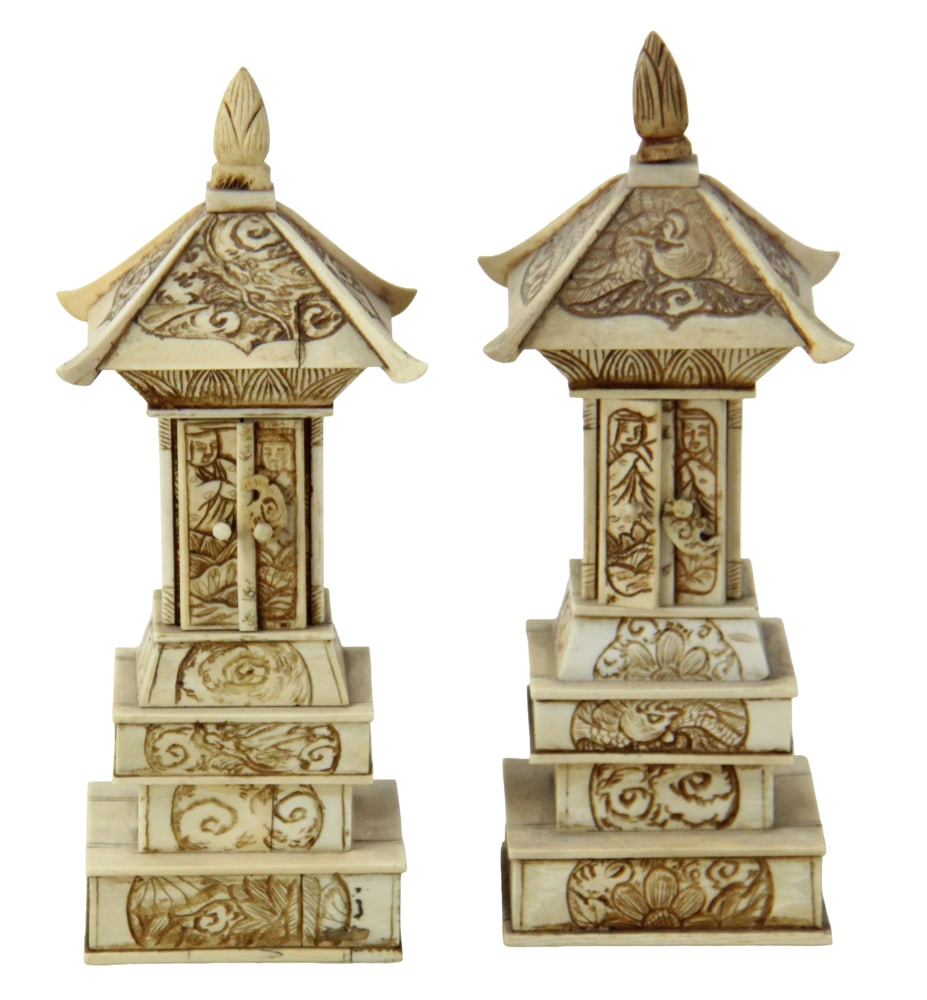 Pair of Carved Bone Pagodas with Shrine: Pair of carved bone pagodas with doors that open to reveal shrine, 8 1/4" H x 3" W x 2 1/2" D. Provenance: New York estate.