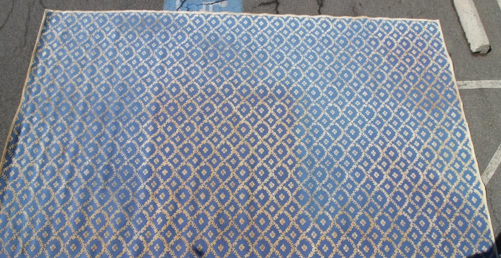Large Custom Broadloom Rug: Custom broadloom rug, light blue with gold floral diamonds, 10' 8" x 19' 10". Provenance: Owings Mills, Maryland collection.
