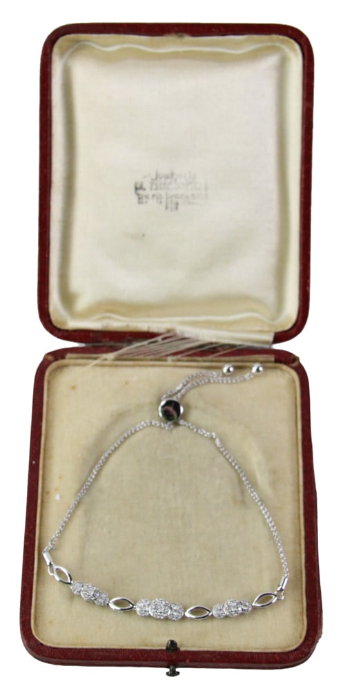 Ladies' 14k White Gold and Diamond Bracelet: Ladies' 14k white gold and diamond bracelet, size 6 1/2. Approximately 4.87 grams TW. Provenance: Mashpee, Massachusetts collection. PLEASE NOTE: payment for silver, gold, jewelry, and coins must be m