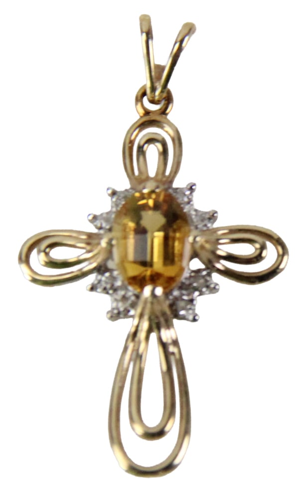 Ladies' Diamond and Citrine Cross: Ladies' diamond and citrine cross, 1 1/2" x 1/2". Approximately 1.35 grams TW. Provenance: Mashpee, Massachusetts collection.