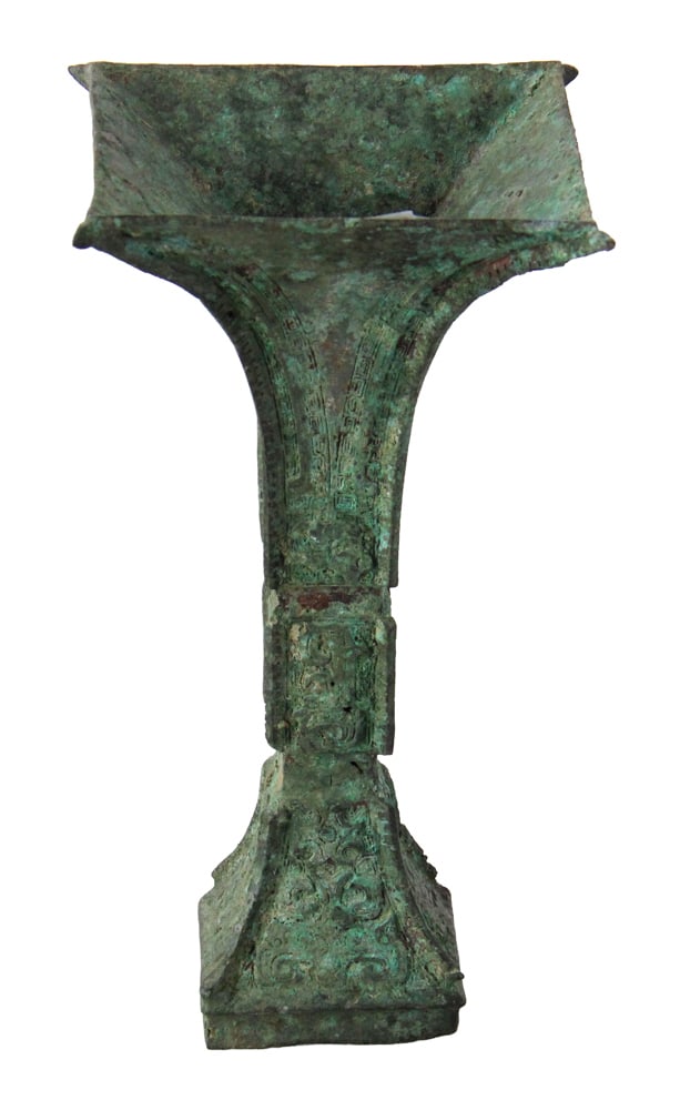 Chinese Archaic Bronze Gu: Chinese archaic bronze Gu, 9" x 4 1/2" x 2 1/2". Provenance: Andover, Massachusetts collection. PLEASE NOTE: On KaminskiLIVE, lots valued at over $3,000 are designated as Premier Lots in the auction