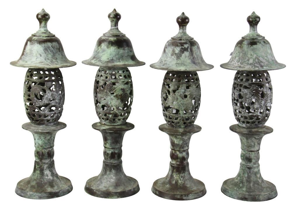Four Japanese-Style Brass Garden/Temple Lanterns: Group of (4) Japanese-style brass garden/temple lanterns with openwork pierced body, 25" x 8". Provenance: Salem, Massachusetts collection.