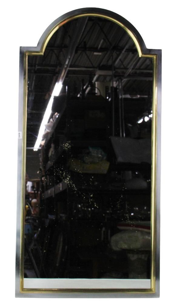 Mastercraft Mirror: Mastercraft mirror, 44" x 22". Mastercraft was the leader in combining brass and chrome (or acid-etched brass) into geometric, architectural forms. The specific technique of nesting a thinner brass fr