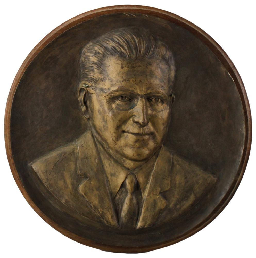 Composition Wall Plaque of Gentleman, on Base: Composition wall plaque of a gentleman, on wooden base, marked A. A. Richman 1969, 21" diameter. Provenance: Southern Connecticut collection.