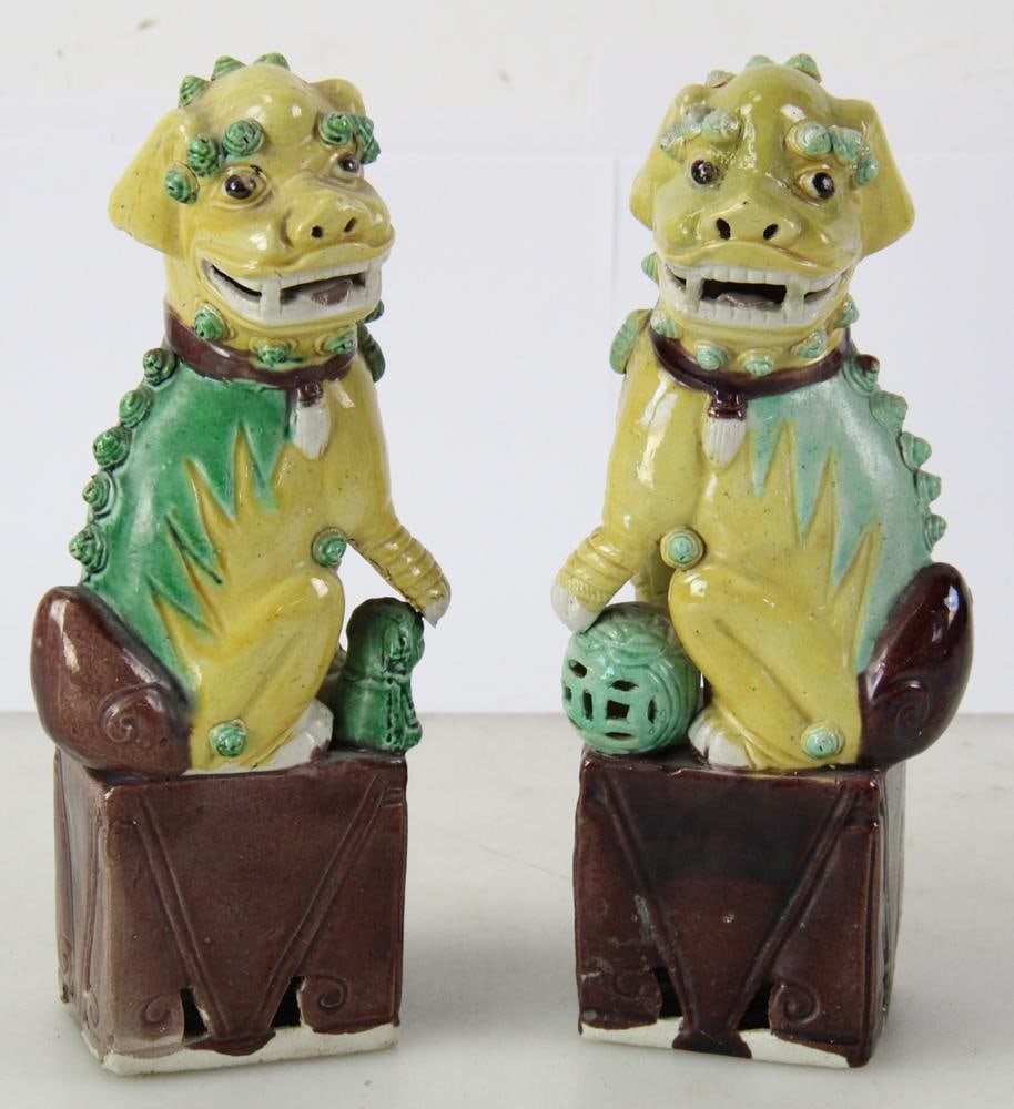 Pair of Chinese Imperial Yellow Foo Dogs: Pair of Chinese Imperial yellow foo dogs, 9" x 3 1/2" x 2". Provenance: Palm Beach, Florida estate.
