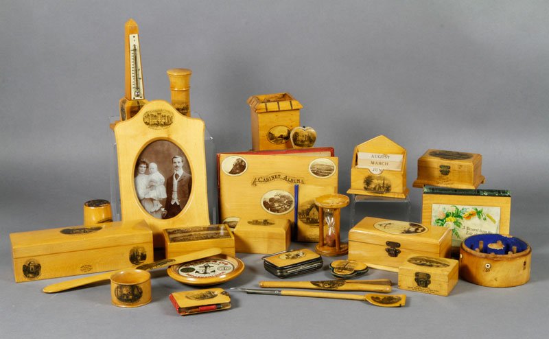 Lot of 25 Pieces of Scottish Mauchline Ware: Lot of twenty five pieces of Scottish souvenir Mauchline ware, to include: calendar holder, cabinet album thread spool holder salad timer bank, page turner picture frame, obelisk thermometer, boxes, e