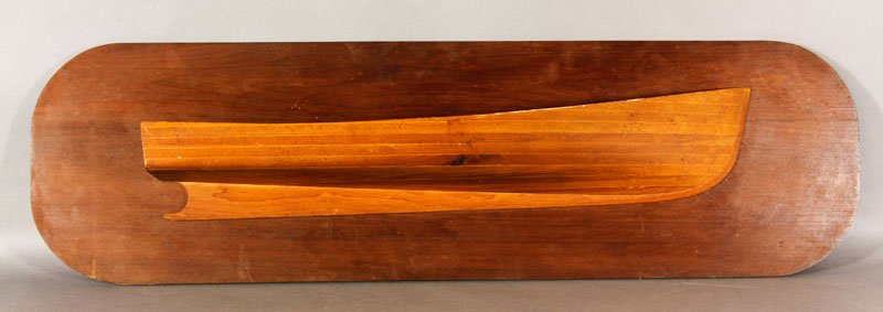 Dockyard Half Hull Model: Dockyard half hull model, mounted on a board, c. 1920, 42" x 12" x 6".