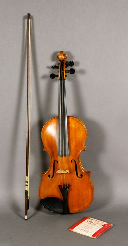 1910 Violin with Round Bow: 1910 violin with round bow, two piece medium curl maple back including spruce top and ebony fingerboard, blonde finish, includes makers label with the name Gustave M Johanssan, indistinguishable signa