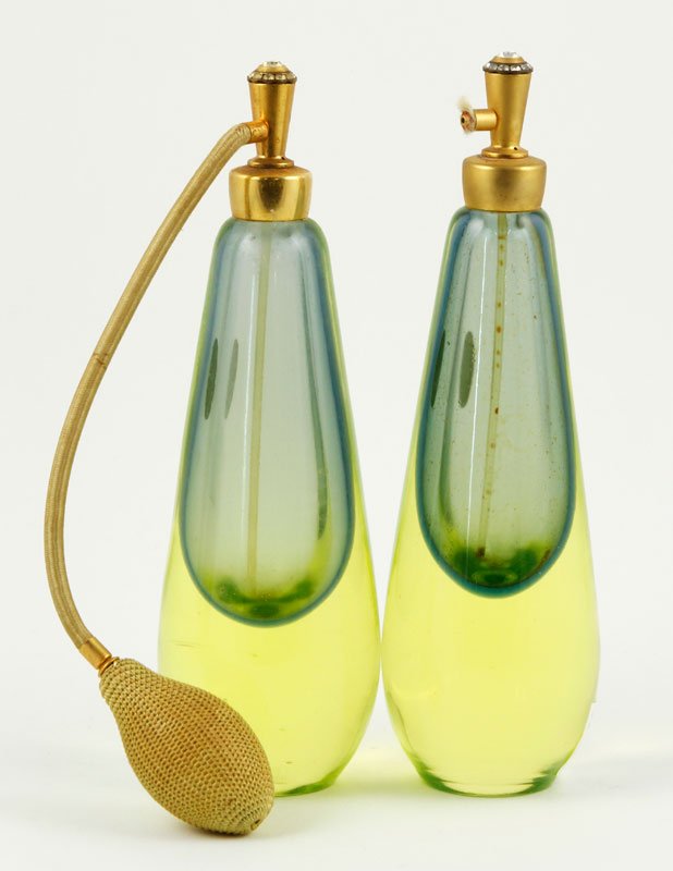 Pair Muranese Sommerso Atomizers: Pair of Muranese Sommerso perfume atomizers, one with original hardware, both with original Murano label and "HolmSpray" label, 8 3/4"h x 2 1/2"dia. Provenance: Collection of Robert Loy.
